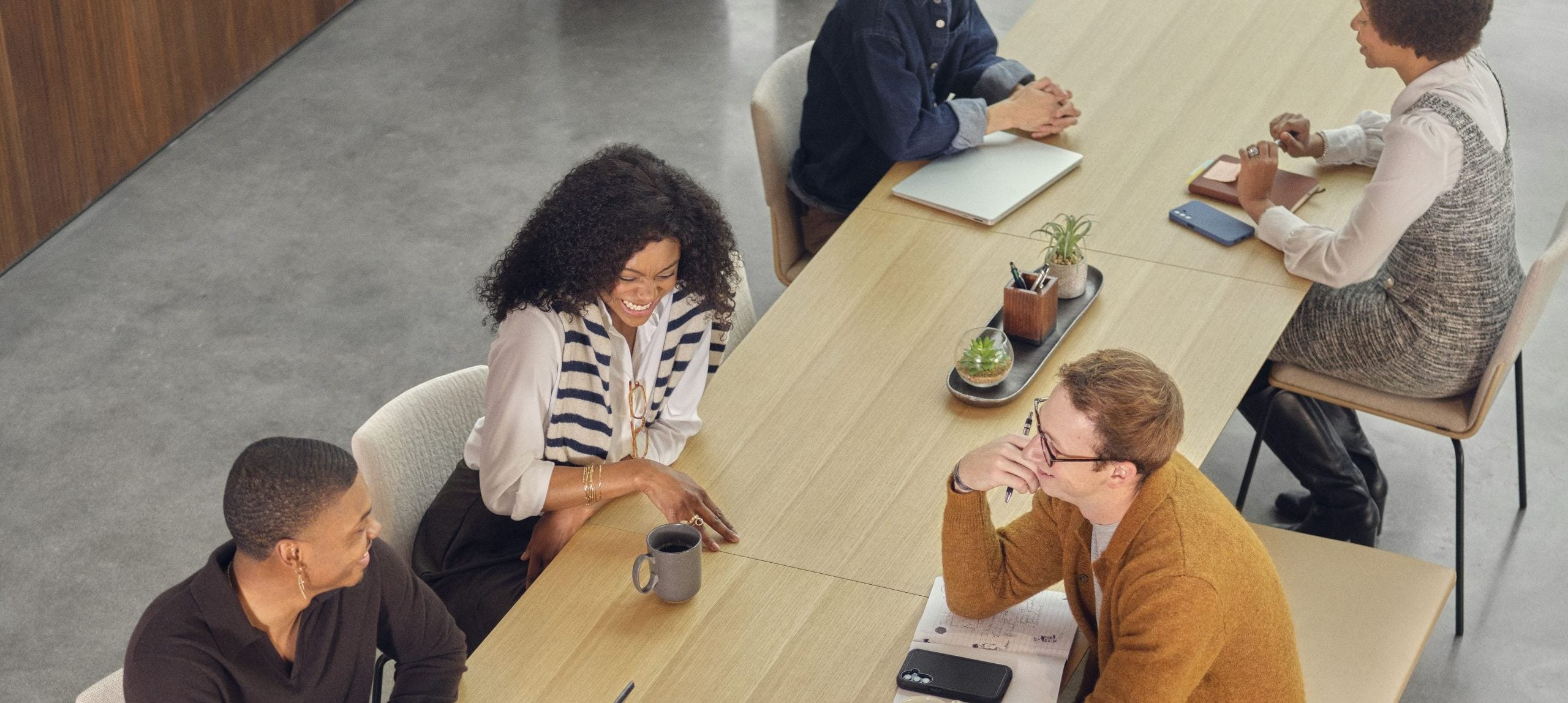 people talking at a table