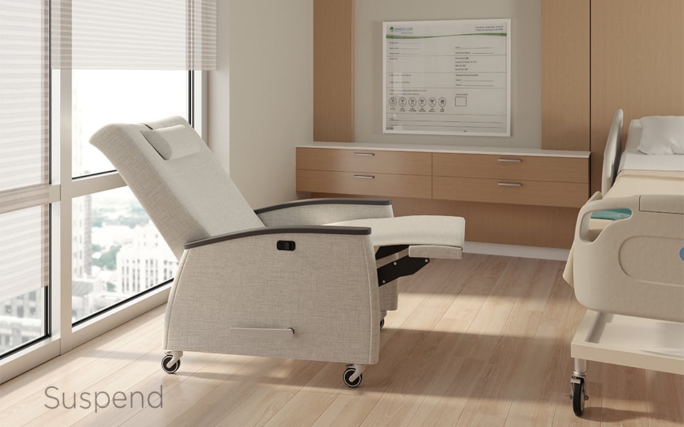 beige patient chair in a light room with wooden walls