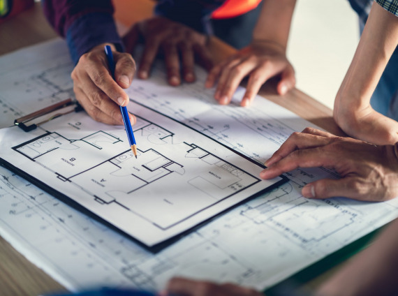Architect & Engineer working drawing document about project plan